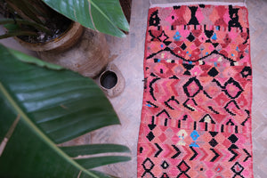 Small pink Boujad Moroccan rug with abstract patterns