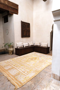 Large vintage Moroccan rug beige and ivory base with yellow motifs