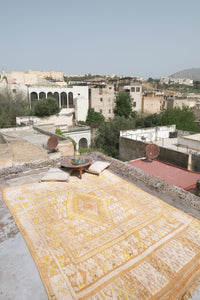 Large vintage Moroccan rug beige and ivory base with yellow motifs