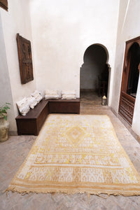 Large vintage Moroccan rug beige and ivory base with yellow motifs